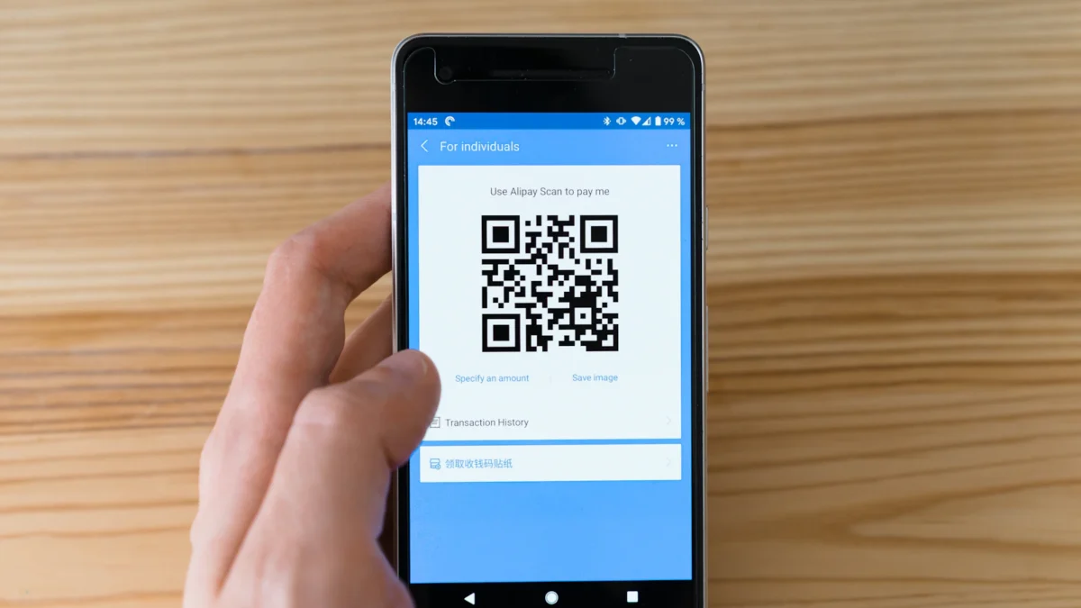 Phone displaying a QR code for payment