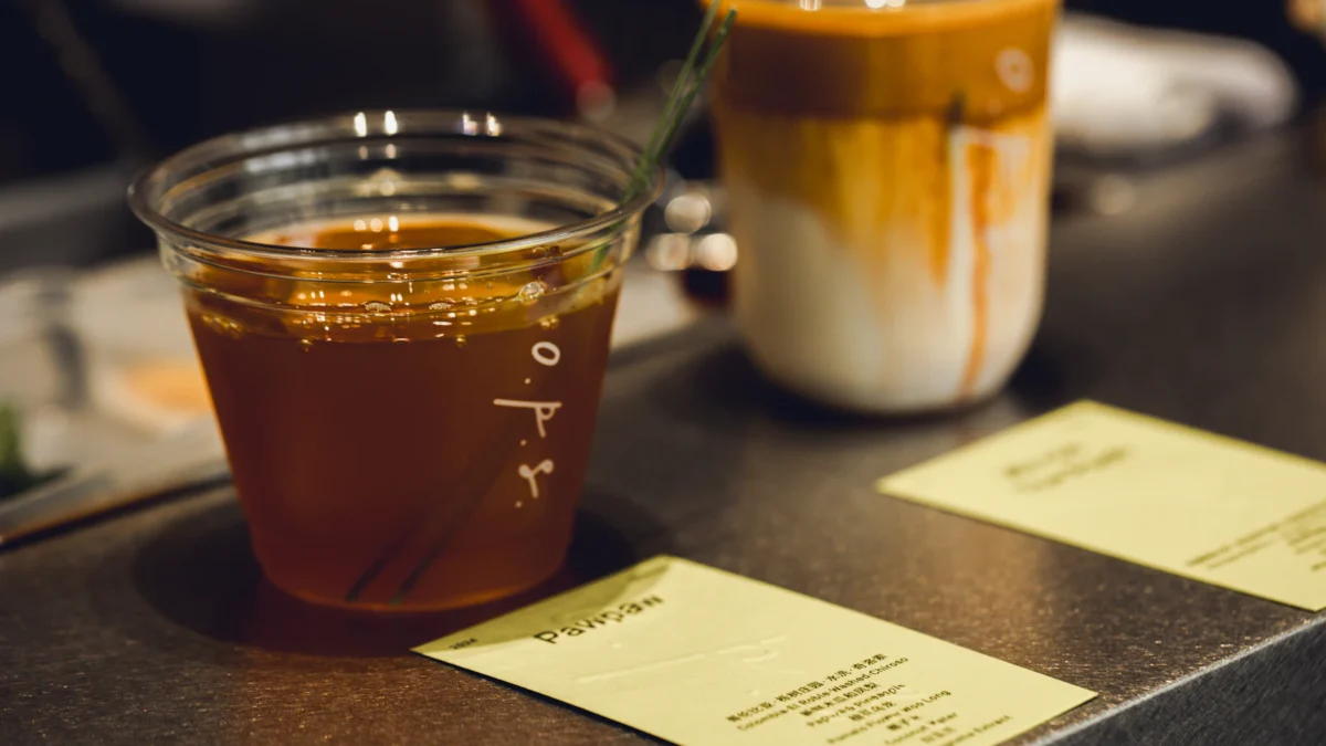 Drinks on a café table with loyalty cards